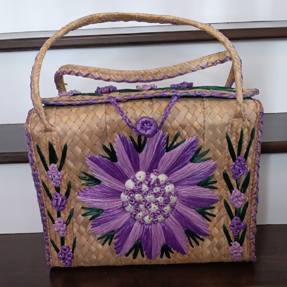 ^ Woven Straw Tote Bag with Purple Floral Embroidery